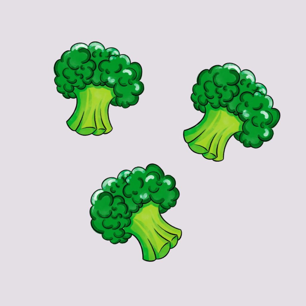 3 brokuły na jasno fioletowym tle